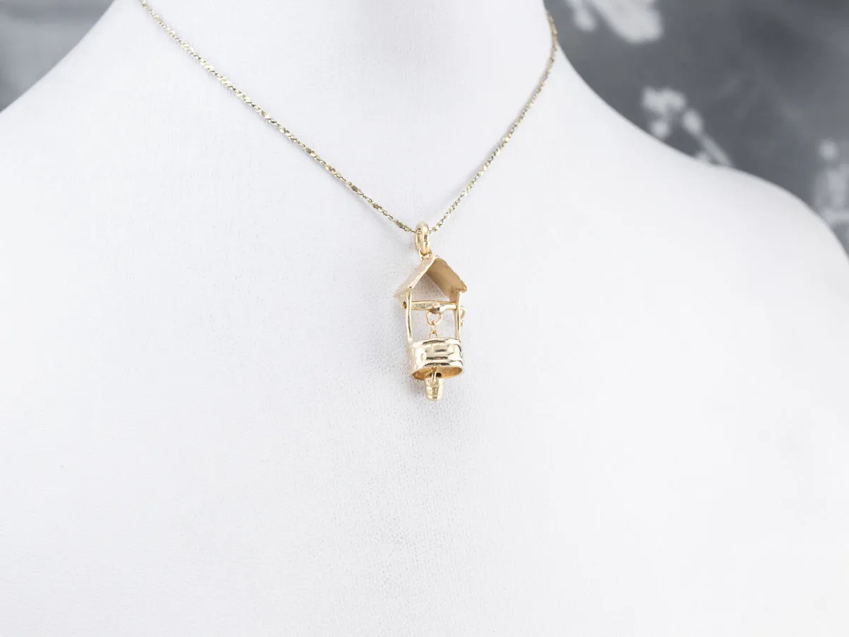 14K Gold Moving Water Well Charm