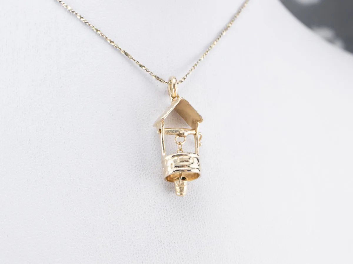 14K Gold Moving Water Well Charm